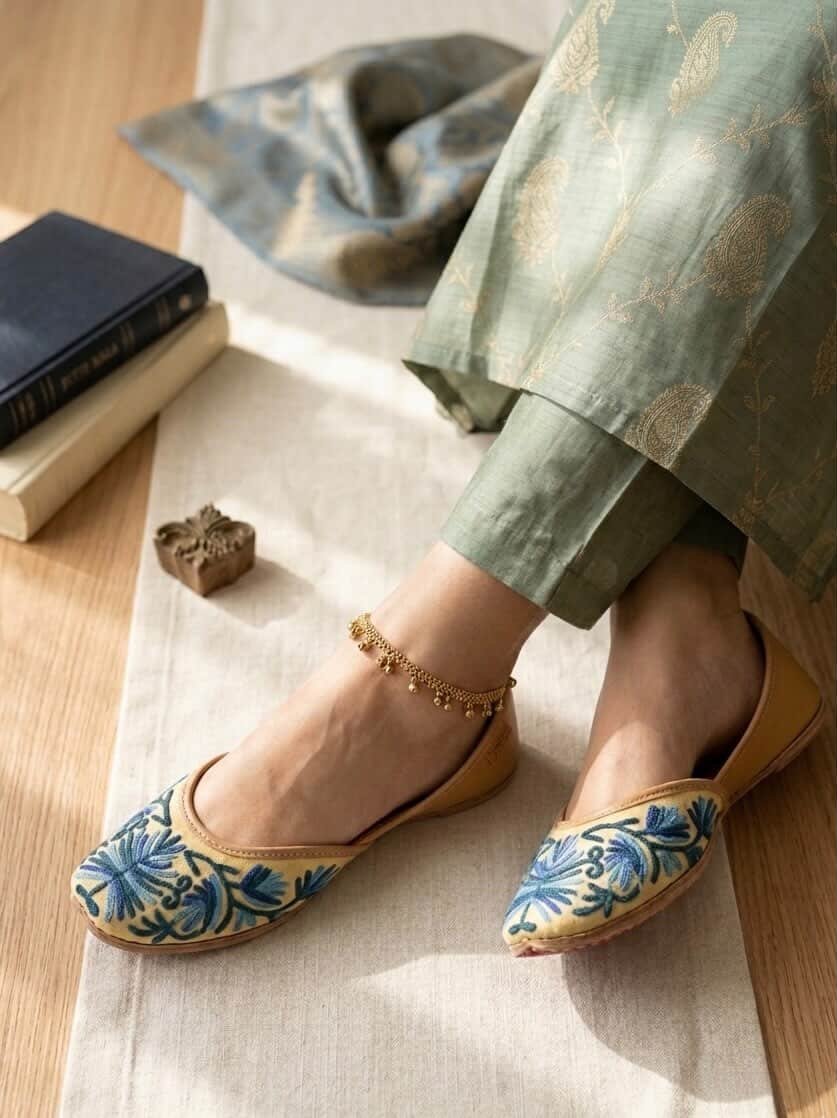 Top view of handcrafted leather jutti with floral design