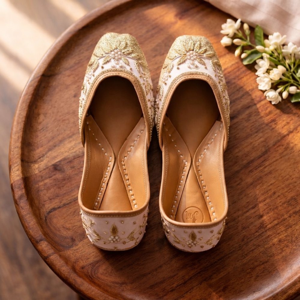 Handcrafted blush pink jutti with pearl and zardosi embroidery for wedding wear