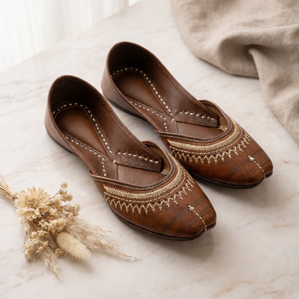 Traditional leather jutti for women paired with saree in elegant ethnic style