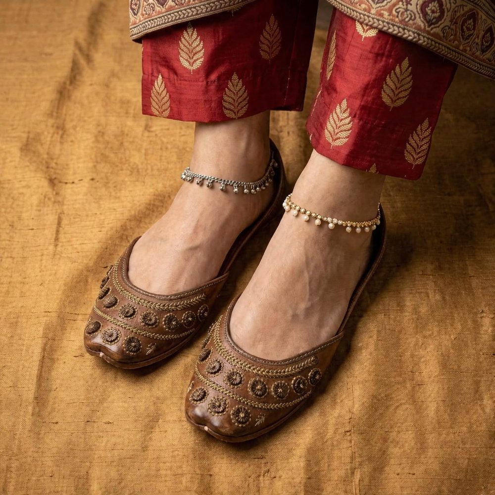 Premium handmade Punjabi jutti top view showing soft leather inner sole and detailed embroidery