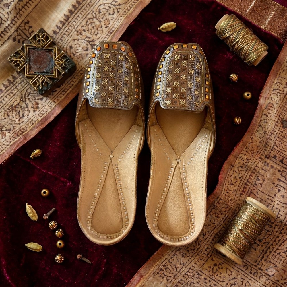 Royal antique gold embroidered leather jutti with handcrafted mojari design and traditional ethnic detailing